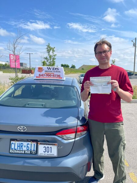 WDS student celebrating a successful road test